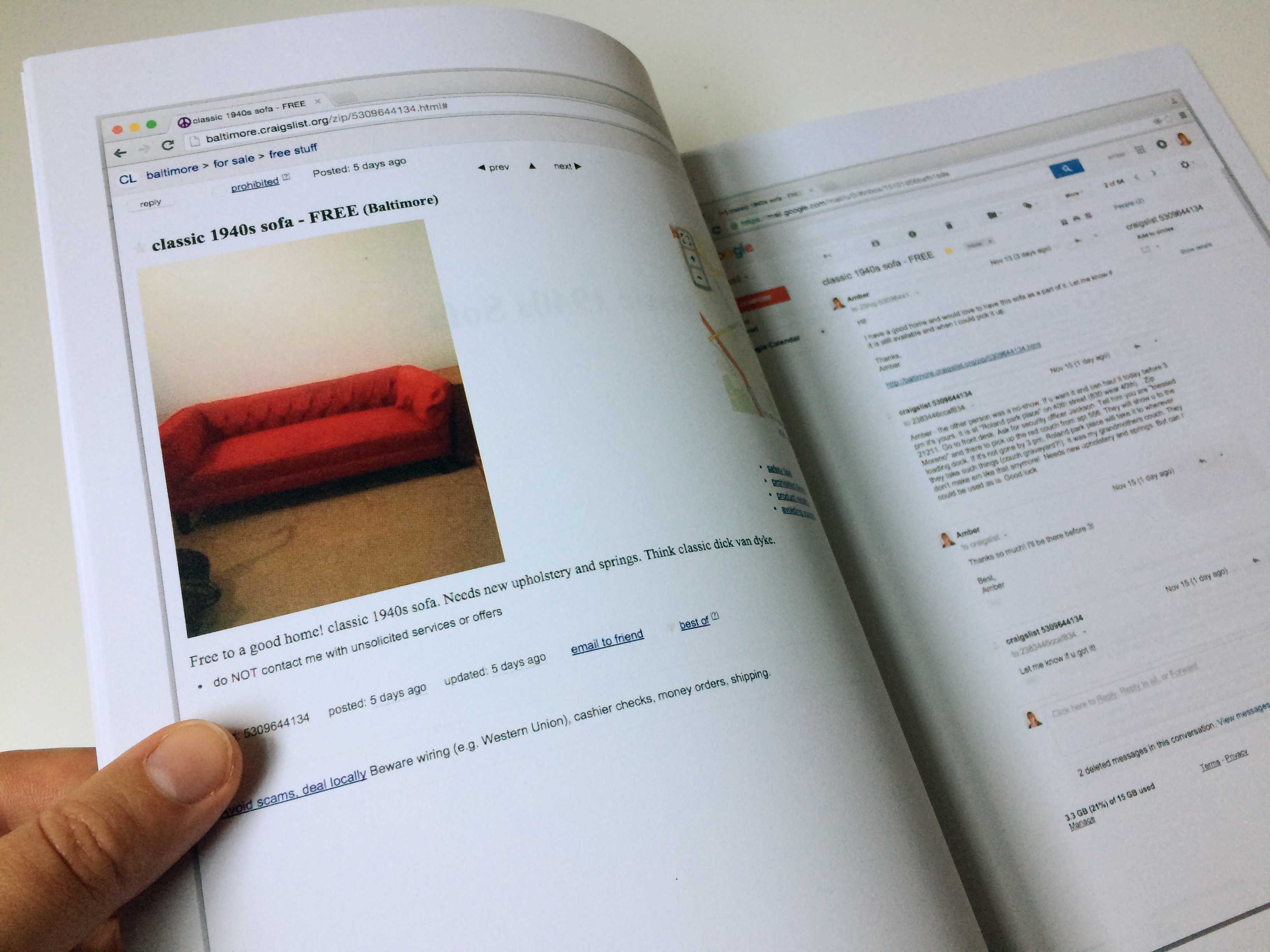 Hand holding book open to display printed screenshot of Craigslist post
